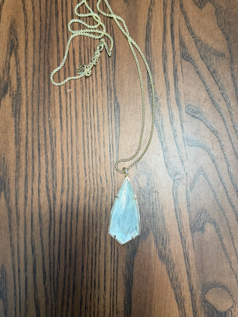 Kendra Scott white mother of pearl statement necklace on gold chain
